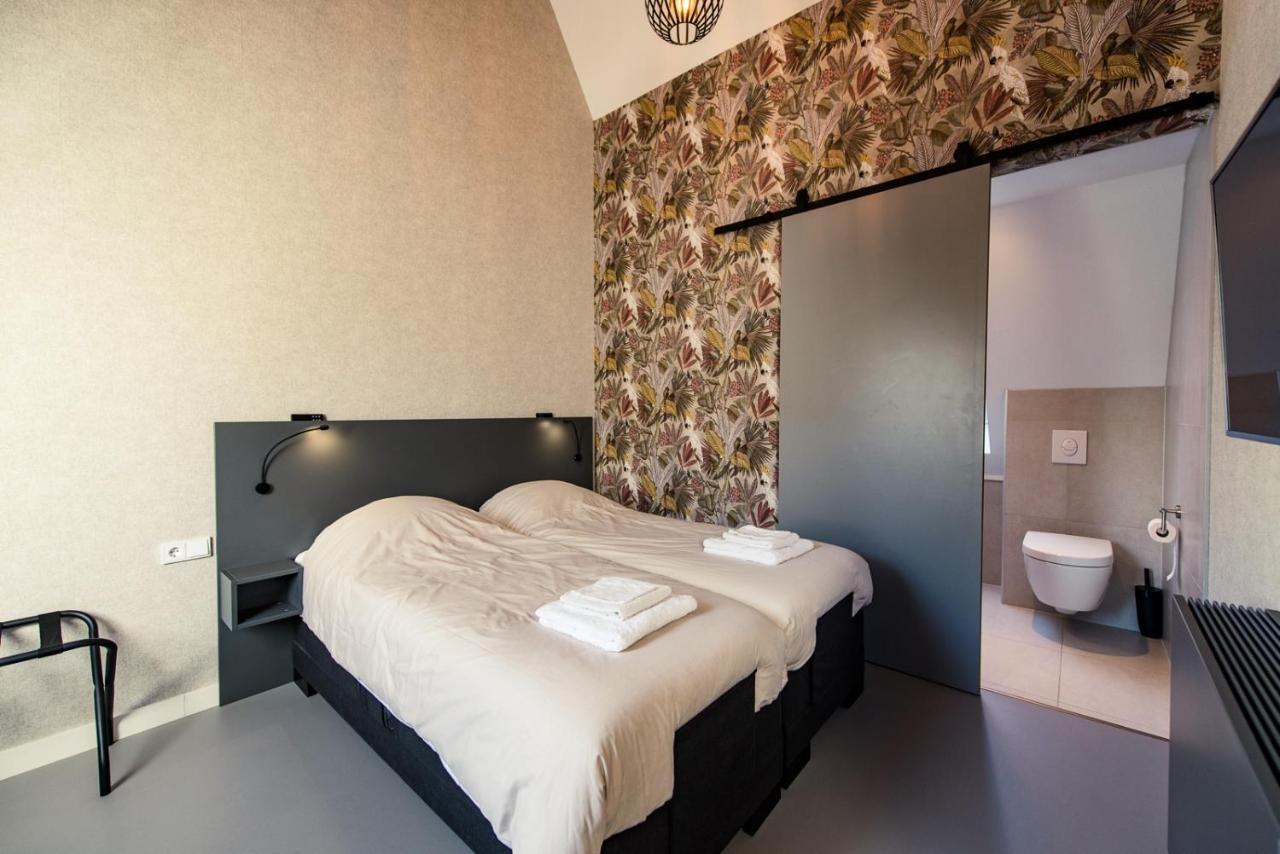 Breeze Ameland Hotel ฮอลลุม ภายนอก รูปภาพ