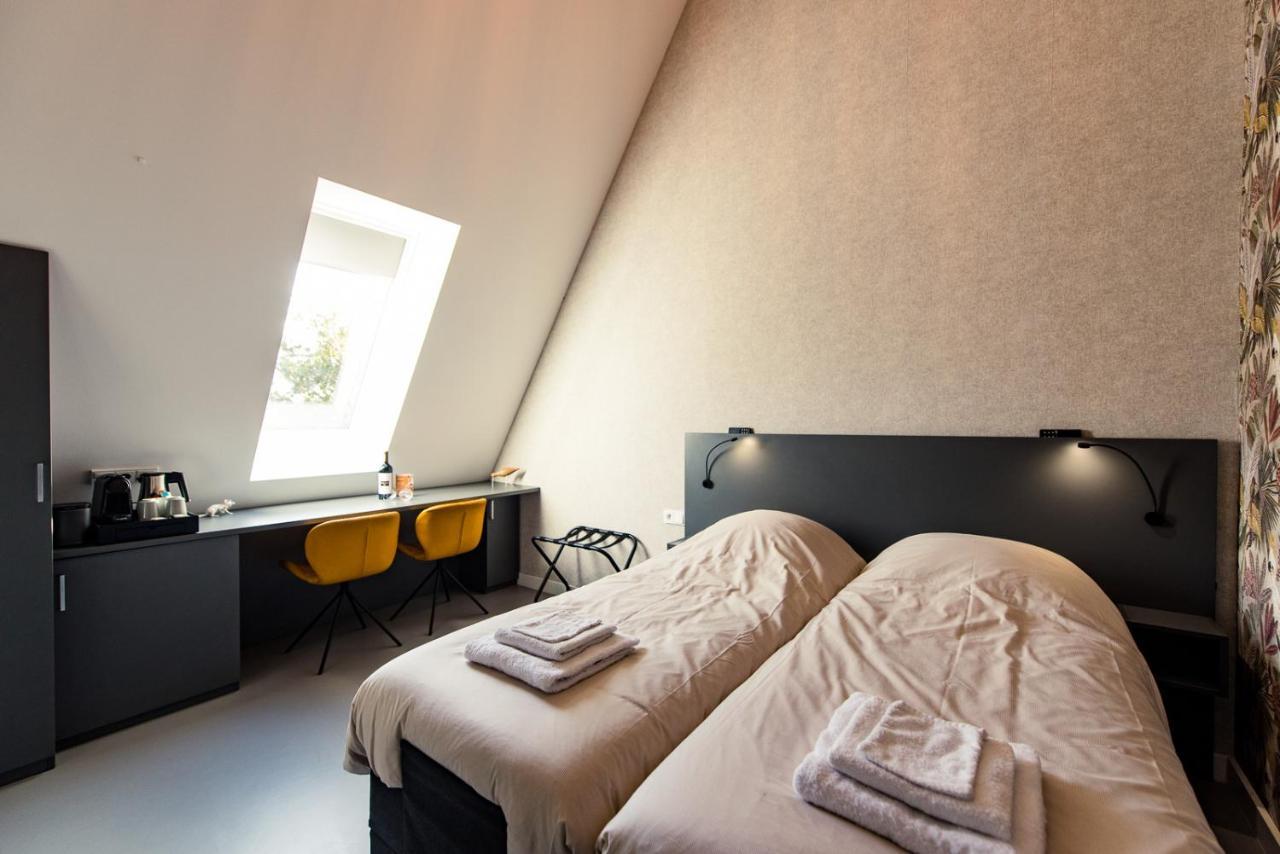 Breeze Ameland Hotel ฮอลลุม ภายนอก รูปภาพ