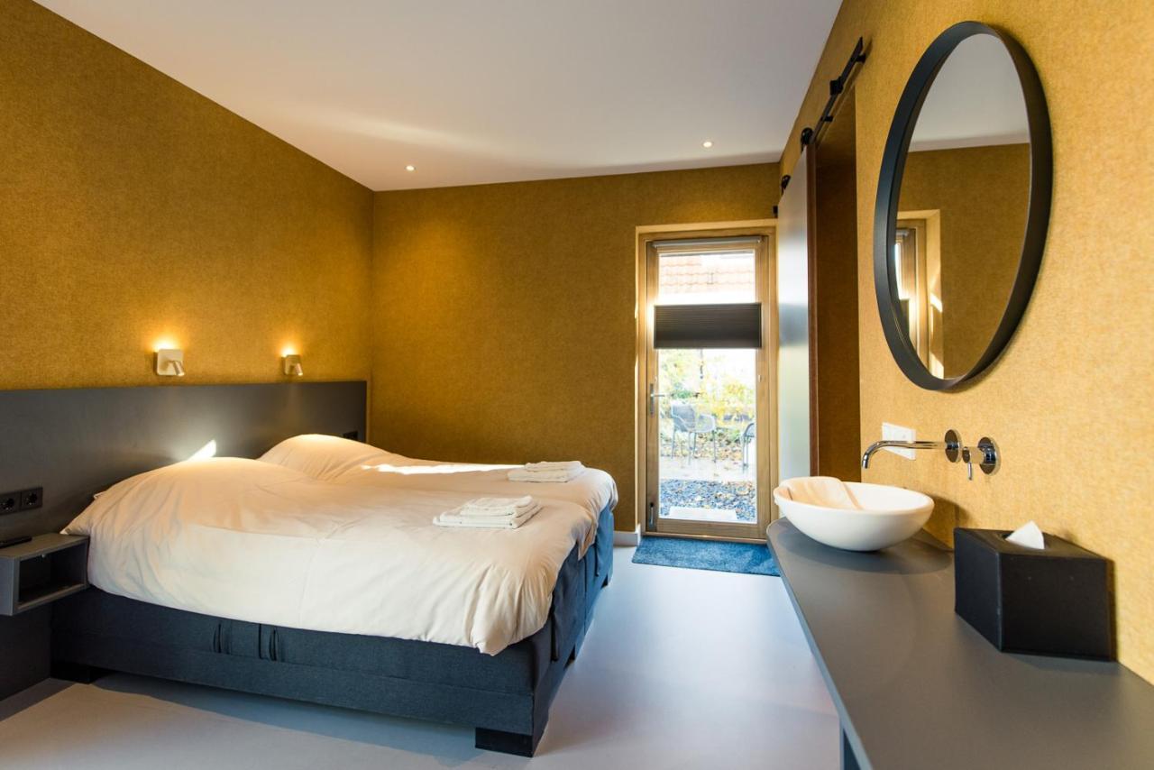 Breeze Ameland Hotel ฮอลลุม ภายนอก รูปภาพ