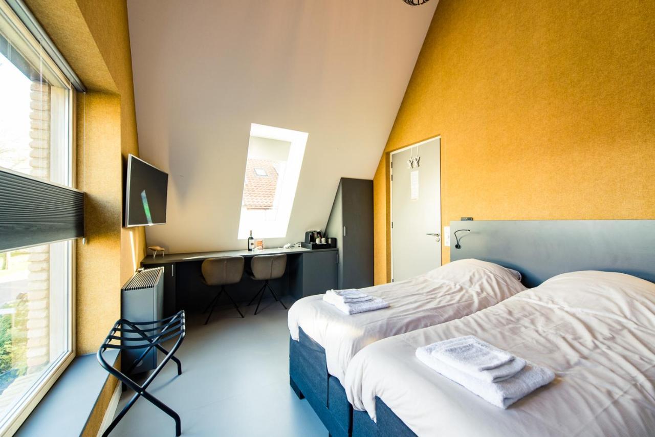 Breeze Ameland Hotel ฮอลลุม ภายนอก รูปภาพ